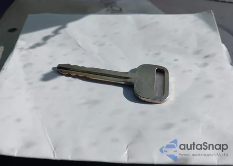 2000 Toyota Corolla Ce из США, поврежденный, VIN 1NXBR12EXYZ374760